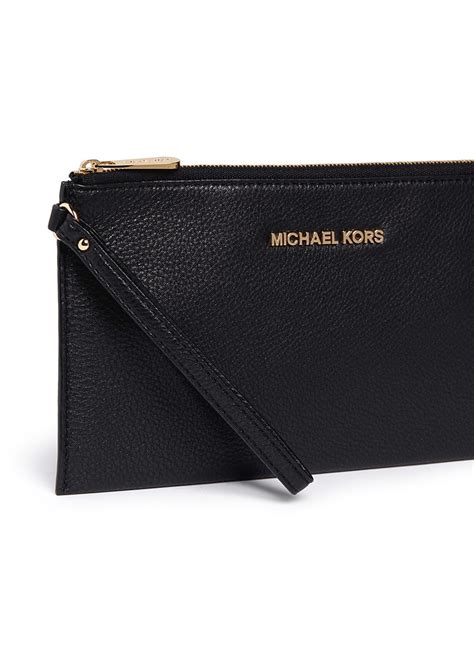 michael kors clutch tasche|Michael Kors women's black clutch.